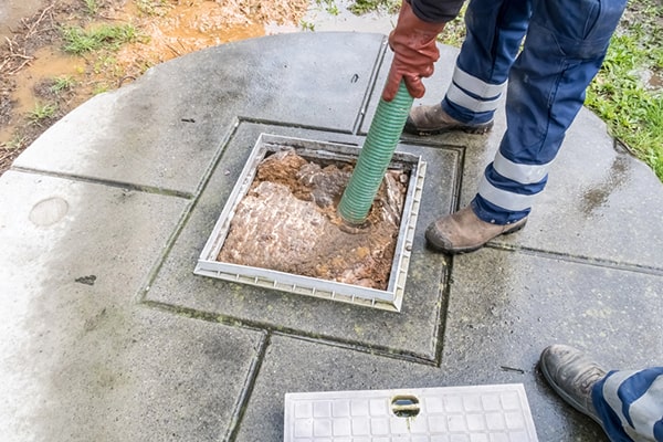 cesspool pumping specifically refers to removing waste and sludge from a cesspool, while septic tank pumping is for septic systems